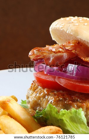 Bacon burger with fries - copy space