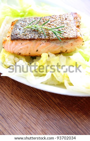 Fresh salmon with salad ingredients