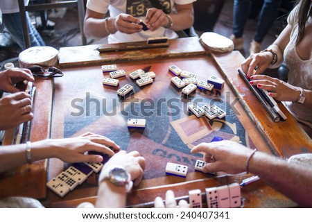 some domino players on the old table