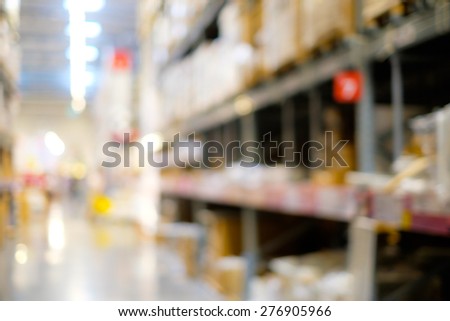 Abstract blur of warehouse with stack of box for background