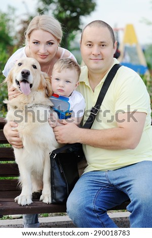 family with a dog retriever