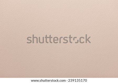abstract background from the painted texture of skin and leather fabric beige color