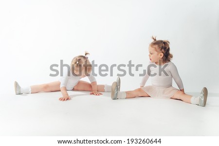 Two little girls gymnastics