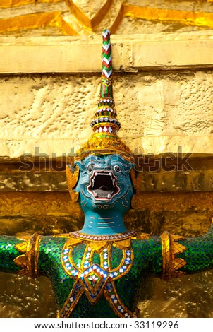 a portrait of guardian statue at grand palace