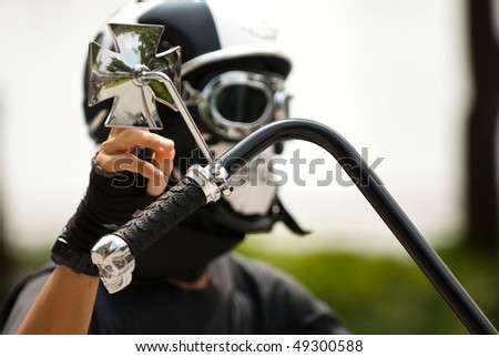 a cyclist biker with a skull-mask