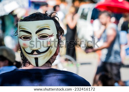Man wearing Guy Fawkes mask during the 2014 G20 Economic Summit in Brisbane, Australia