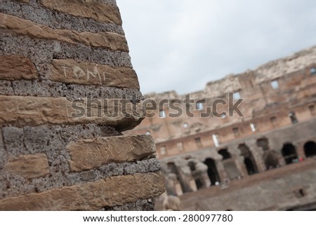 ROME, ITALY - CIRCA JANUARY, 2015 - Writings on a wall inside the Coliseum.