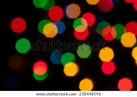Bright festive background with colorful round lights.Festive illuminations de focused