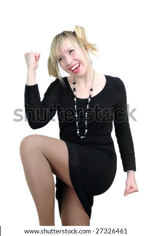 stock photo Leggy blonde in black dress exclaiming Yes on the white