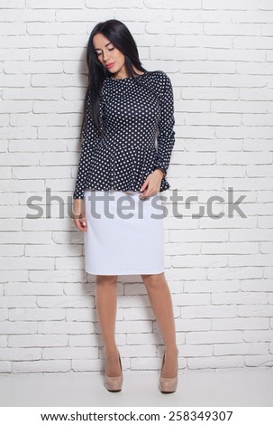 Full body woman portrait standing in business dress suit in full length isolated on white background.
