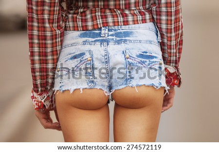 Sexy woman body in jean shorts. The model is back. Lonely girl .Great ass.