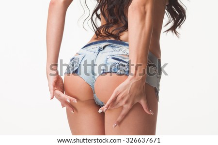 Sexy woman body in jean shorts. The model is back. Great ass.