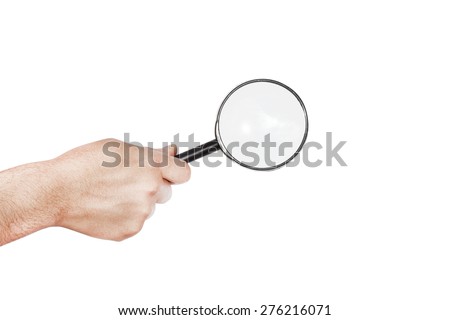 Man\'s hand, holding classic styled magnifying glass, closeup isolated on white background, copy space for your image or text, Magnifying glass in hand isolated on white background