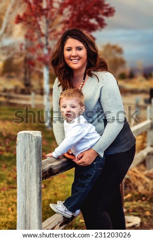 Mom playing with her young son -- image taken at Bartley Ranch Regional Park in Reno, Nevada, USA