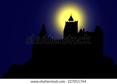 The original Dracula\'s castle night with moon in the background.
