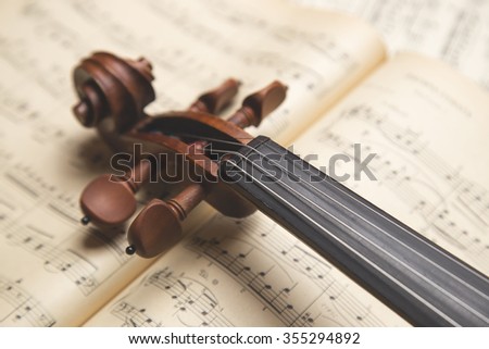 Vintage violin on the  sheet music.