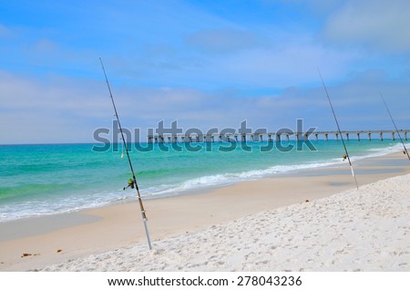 Fishing in the Gulf of Mexico, Panama City, FL, USA.  Pier stretching out into the ocean.