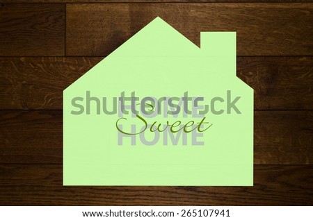 Home sweet home sign on wooden background