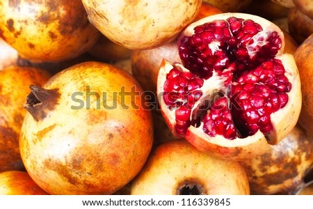 Pomegranate fruits on the market booth