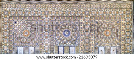 Oriental colorful tile ornamented wall in Marrakesh, Morocco