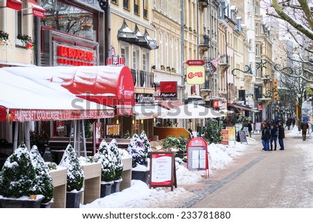 Luxembourg - DECEMBER 26: Snow covered pedestrian street in Luxembourg city on a cold winter day. Luxembourg on December 26, 2013