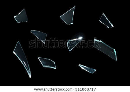 broken glass with sharp Pieces over black