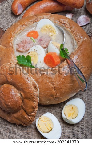 Easter white borscht with eggs and sausage in a bread bowl