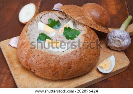 Easter white borscht with eggs and sausage in a bread bowl