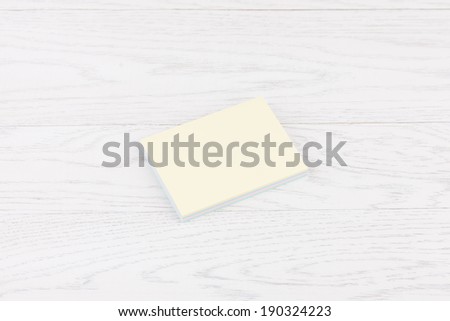 Pack of sticky stickers note on wooden white background
