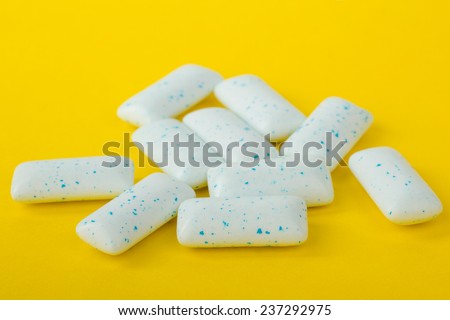 chewing gum on a yellow background