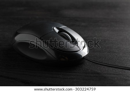 computer mouse on a black background