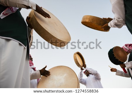 A group of men perform a traditional Saudi Arabian dance and singing in Janadria Festival.