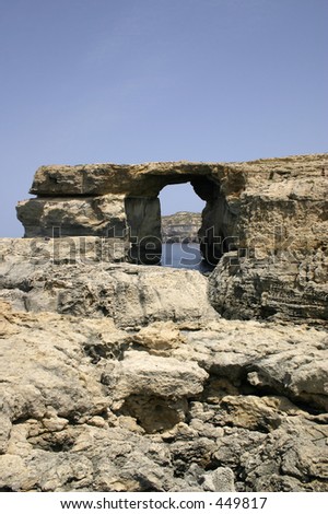 Huge rock formations at Dwejra, Gozo, Malta. This naturally cut window is better known as the Azure Window.