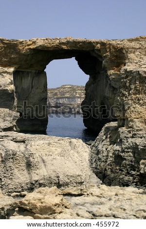 Huge rock formations at Dwejra, Gozo, Malta. This naturally cut window is better known as the Azure Window.