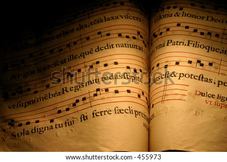 An old Christian Hymn book, normally used in choirs with musical notes and written in Latin