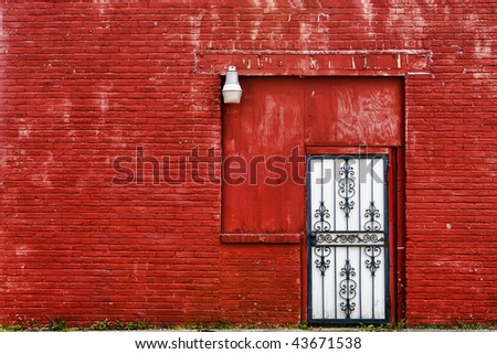 Brick wall with door and light