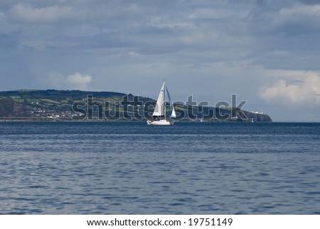 Small Yacht leaving an irish harbour
