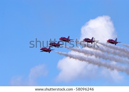 RAF FAIRFORD -JULY 18: The RAF Red Arrows at the Royal International Air Tattoo July 18, 2010 in Fairford, United Kingdom