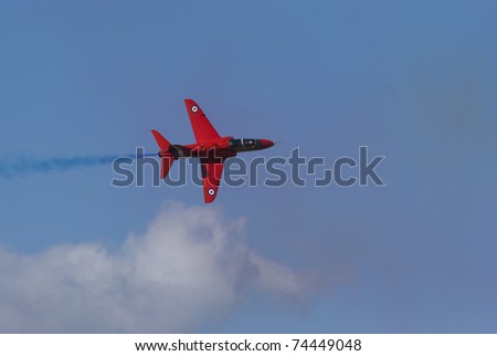 RAF FAIRFORD -JULY 18: The RAF Red Arrows at the Royal International Air Tattoo on July 18, 2010 in Fairford, United Kingdom