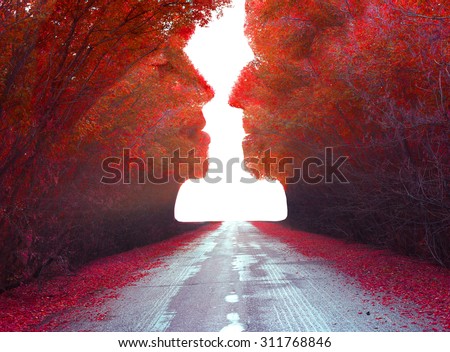 Autumn magic landscape .Trees in the shape of a human heads