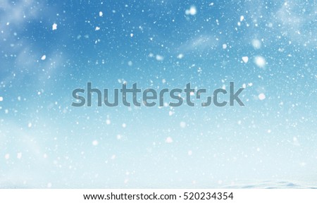 Winter christmas sky with falling snow