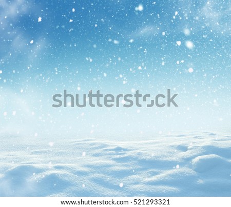 Christmas background with snow and blurred bokeh. New Year greeting card with copy-space.Winter landscape with falling snow