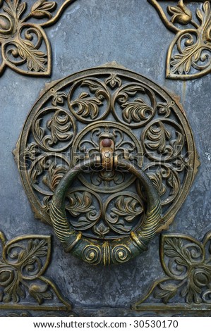Bronze knocker on the church door