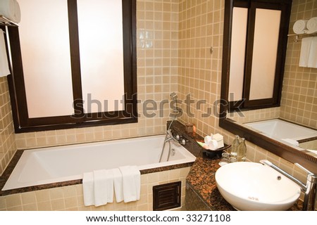 mirror on a wall of bathroom