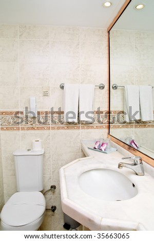 mirror on a wall of bathroom