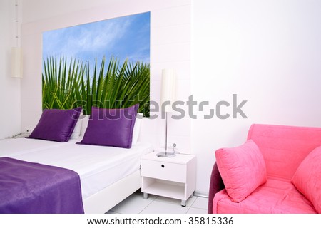 Sleeping room in a hotel. Photograph on the wall made by author