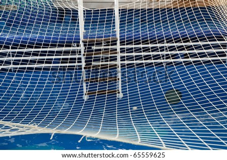 closed swimming pool with safety net