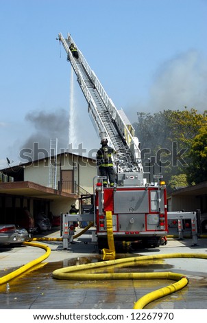 Fireman and fire truck at an apartment fire