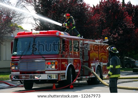 Firemen and fire truck at an apartment fire