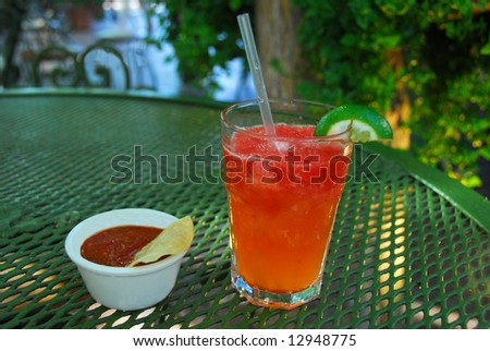 Strawberry Lemonade Drink with Chip and Salsa at an outdoor restaurant